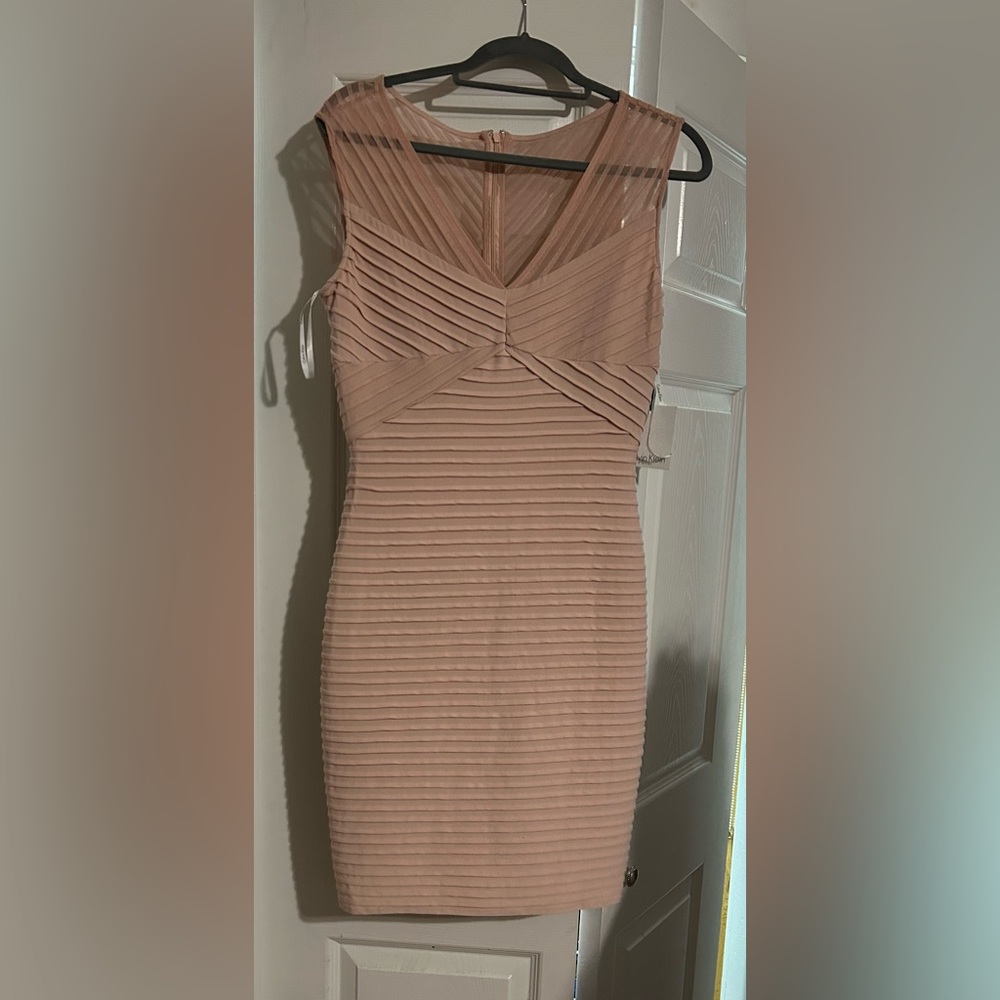 New with tag sleeveless light pink dress.